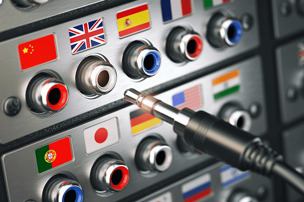 auxiliary cable plugging into various countries showing some of the languages that can be interpreted and translated